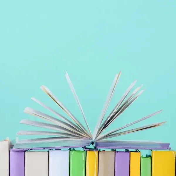 A decorative image with some books ro represent Books And Reading.